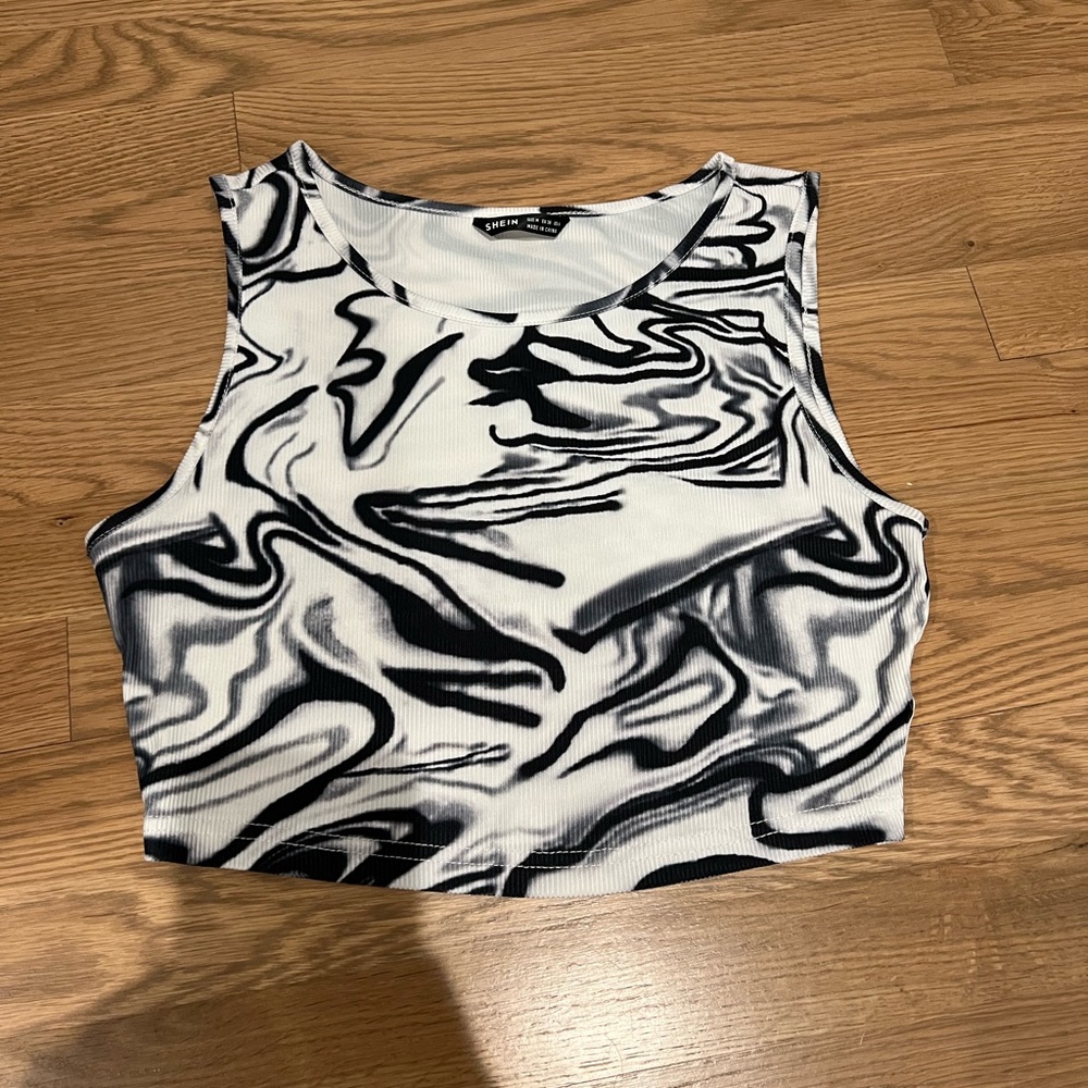 Super cute going out top - black and white marble design. Only worn once!